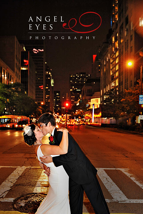 Bride And Groom Michigan Avenue Downtown Chicago Romantic Kiss Allerton Hotel Angel Eyes Photography