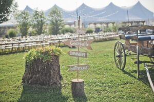 String Lights And Sign At A Heritage Prairie Farms Wedding Tile