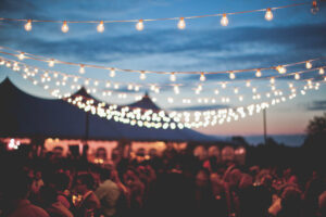String Lights At Night At A Heritage Prairie Farms Wedding Tile