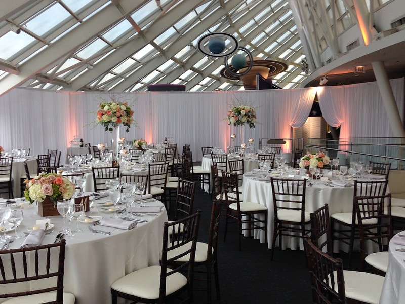White Tables And Chairs And White Drape Wall