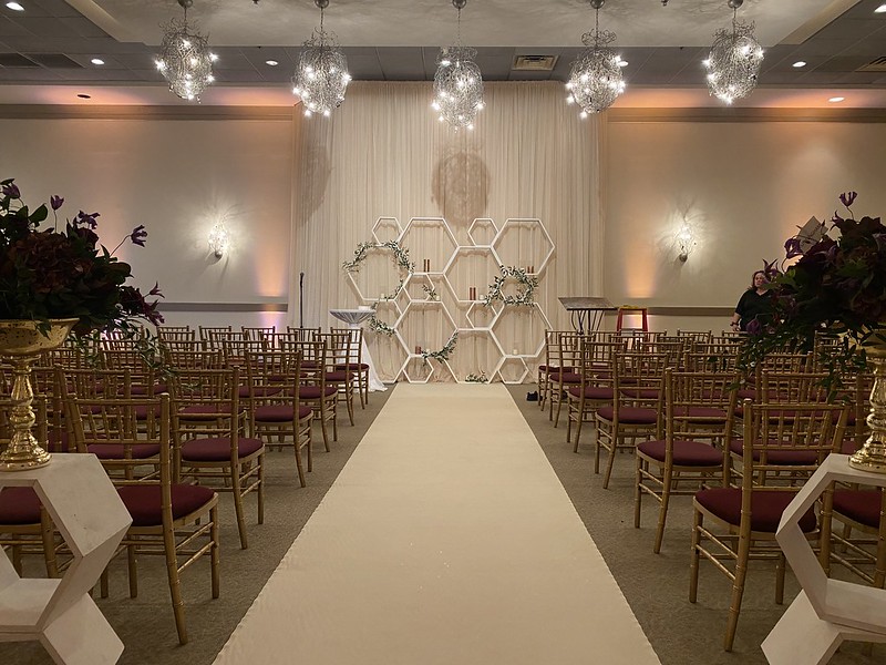 Elegant Chandeliers In The Front Of The Aisle