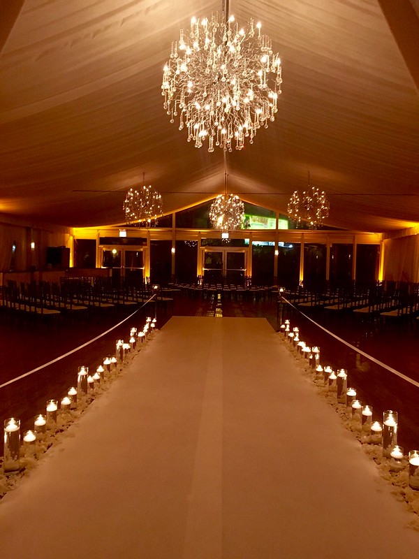 Elegant Crystal Chandeliers Above The Aisle