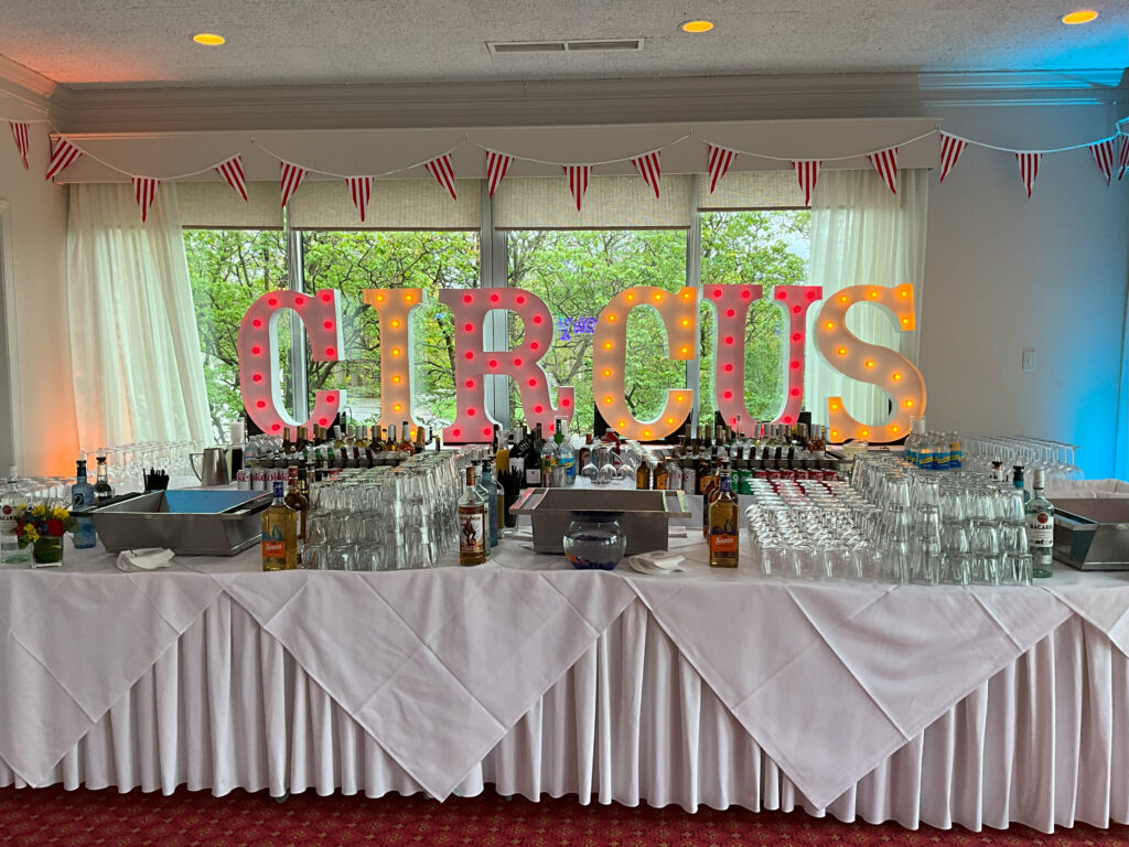 Marquee Letters Spelling Out &Quot;Circus&Quot; In Circus Theme Party
