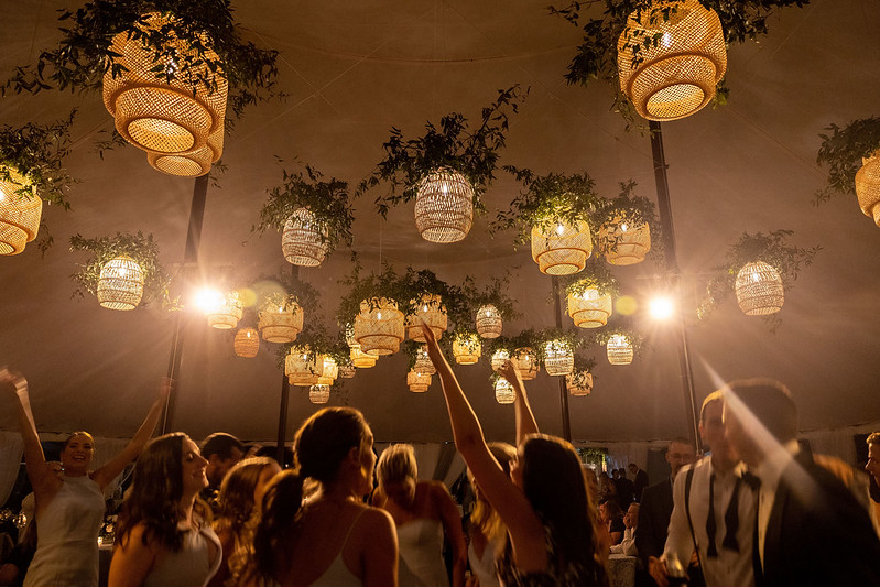 Rattan Lanterns At Night In A Tent Wedding