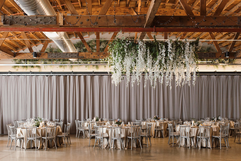 Wedding Reception With Hanging White And Greenery