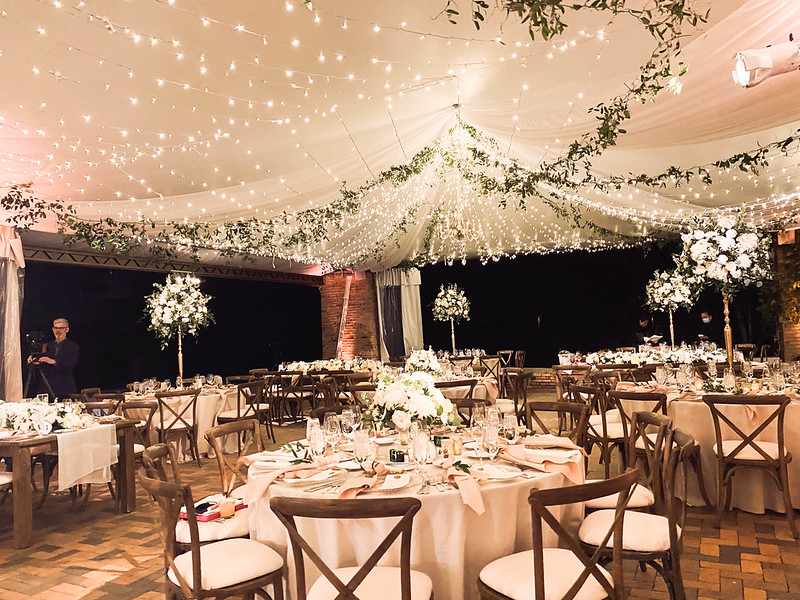 Tent With String Lights And Greenery
