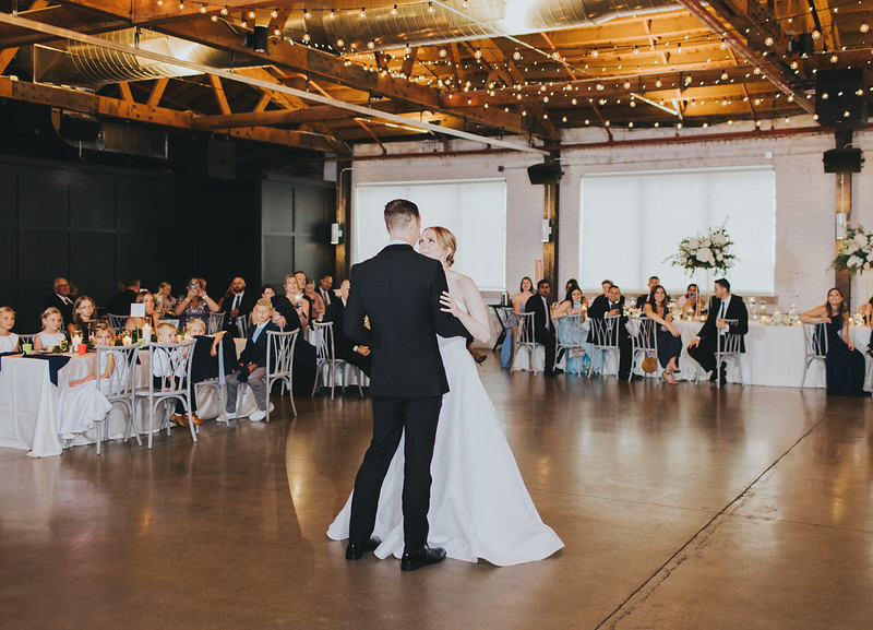 Bride And Groom Dancing Under The String Lights At Their Walden Chicago Wedding