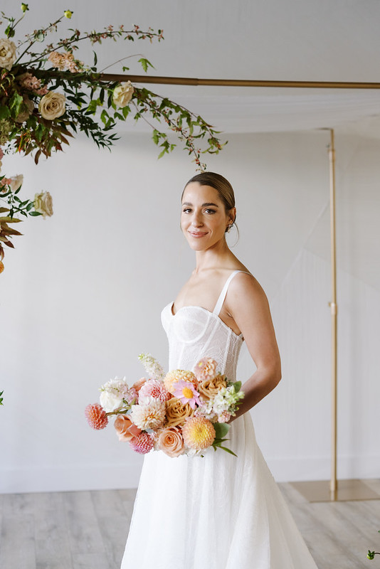Bride In Her Wedding Dress Holding A Bouquet