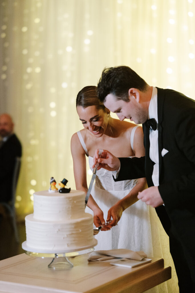 Hannah And Declan Cutting Their Wedding Cake