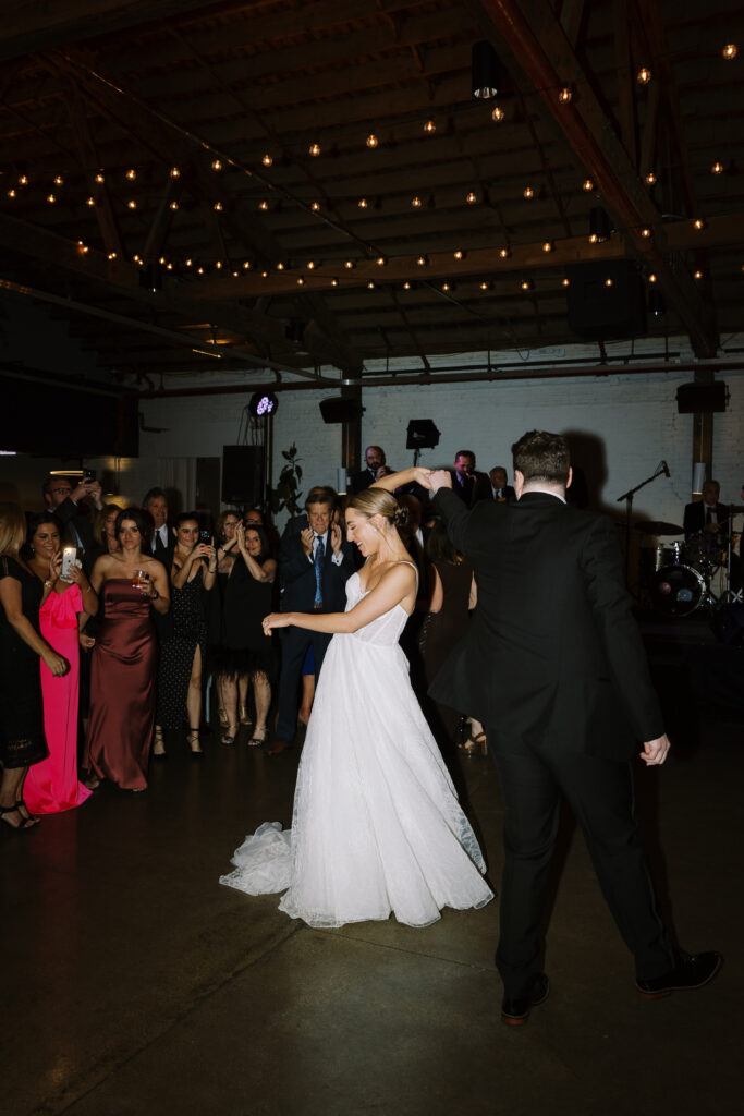 Hannah And Declan Dancing While Their Guests Are Watching Them
