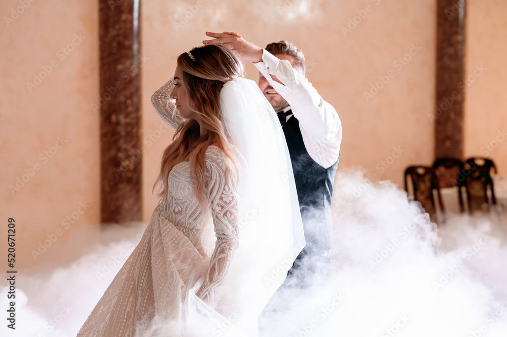 Bride And Groom Dancing On The Clouds