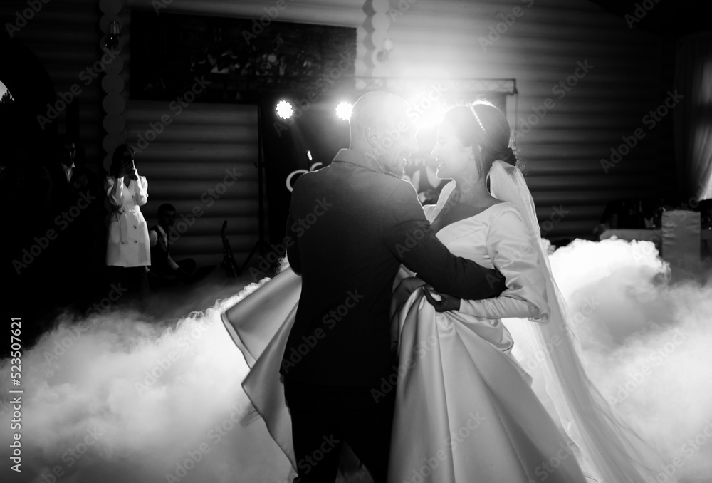 Bride And Groom Dancing On The Clouds