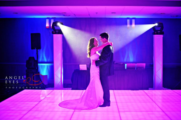 Bride And Groom Dancing With Wedding Lighting Effects