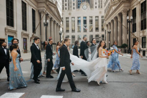 Bride And Groom And Their Bridesmaid And Groomsmen At The Board Of Trade