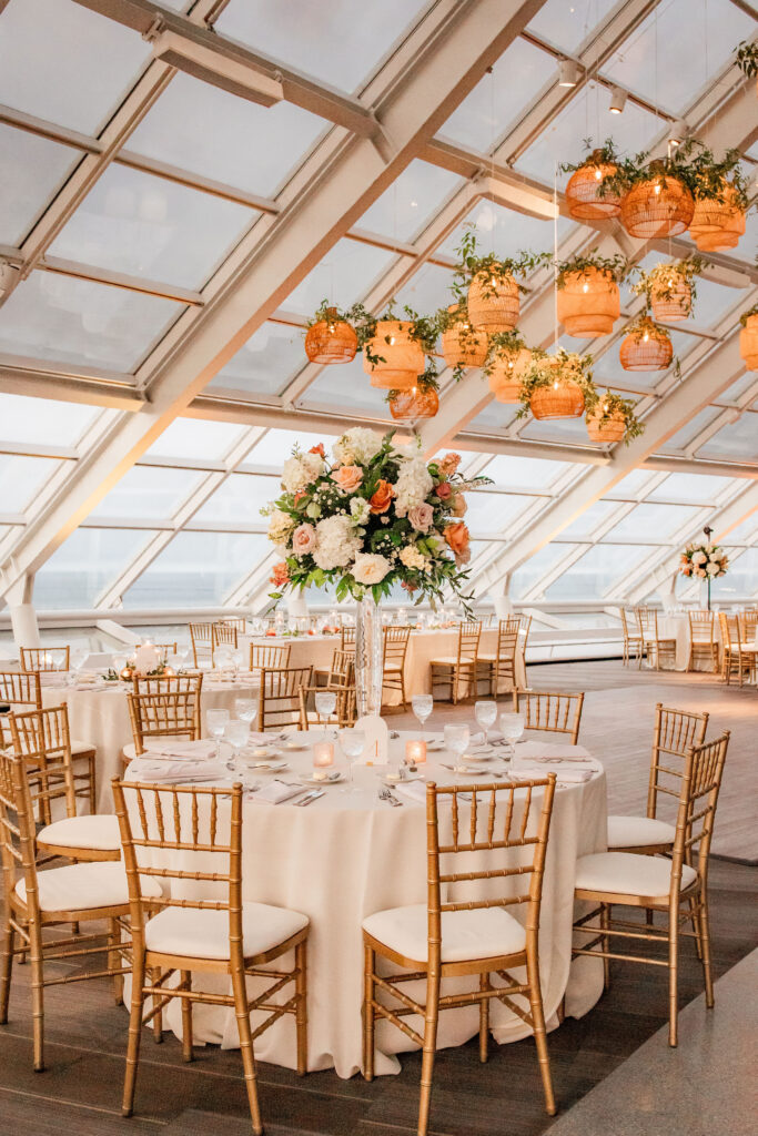 Rattan Lanterns And Floral Decor Table Centerpiece