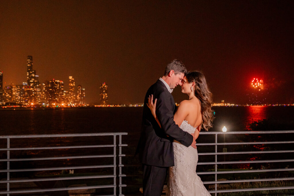 Bride And Groom Watching Fireworks Display