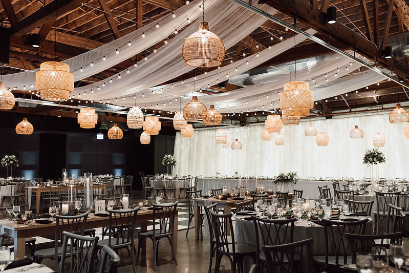 Rattan Lanterns With String Lights And Ceiling Drape