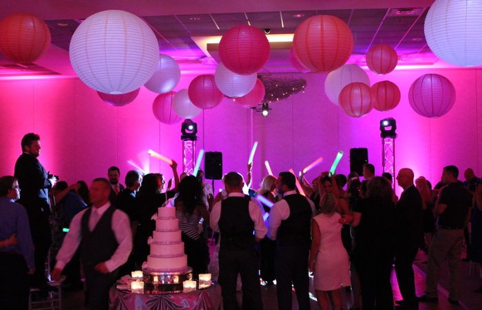 Wedding Guests Dancing Under Pink And Whites Paper Lanterns