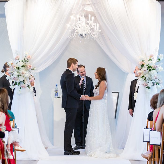 White Draped Wedding Canopy With Chandelier