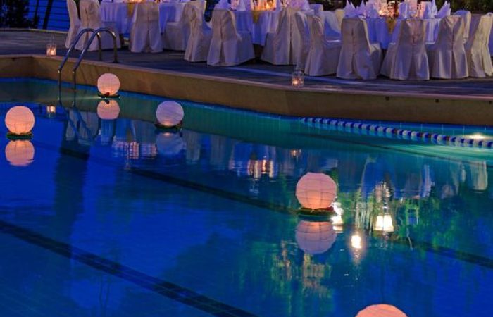 Floating Paper Lanterns In The Pool